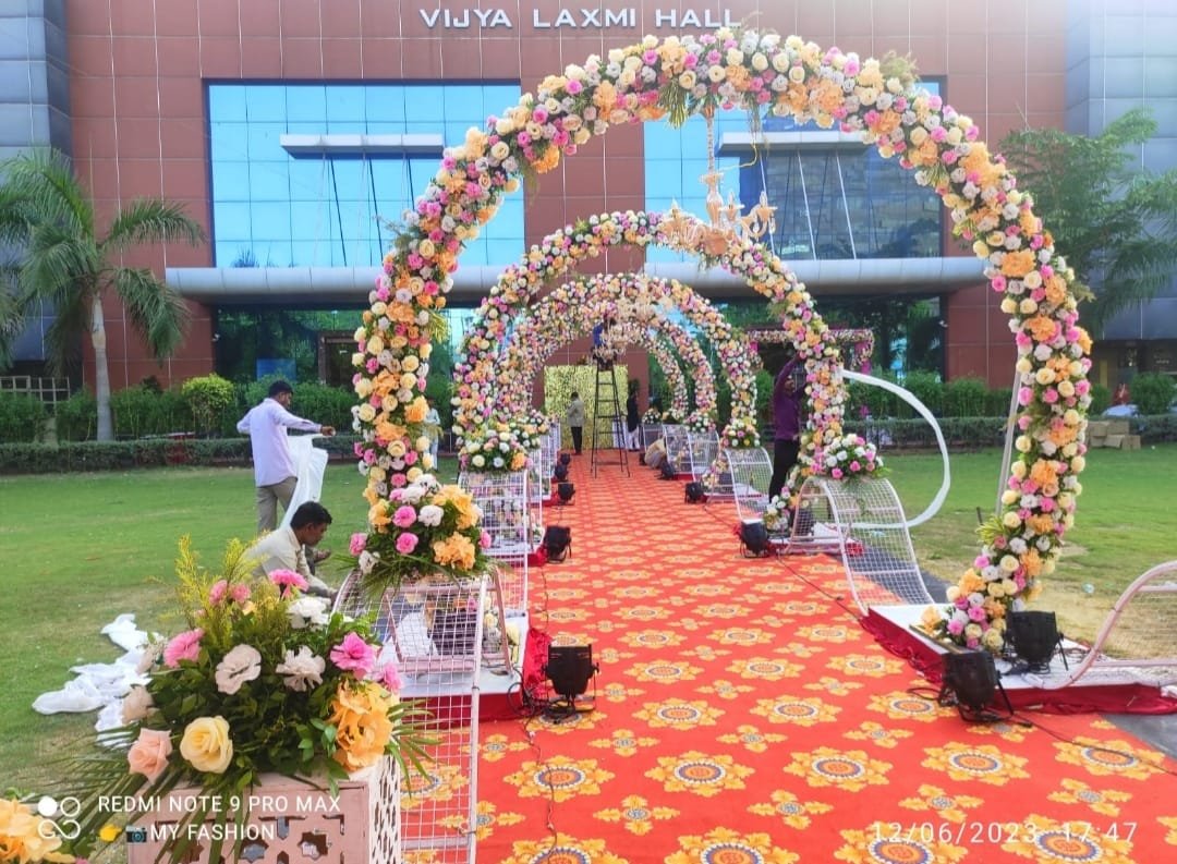 Floral designer creating intricate wedding arrangements