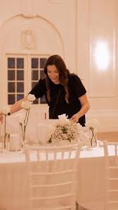 Wedding planner presenting comprehensive timeline and design concepts