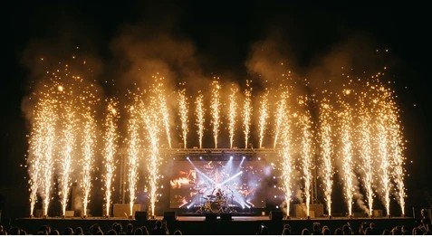 Confetti cannon celebration during wedding reception with colorful effects