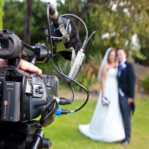 Cinematic wedding videography with multiple camera angles and professional equipment