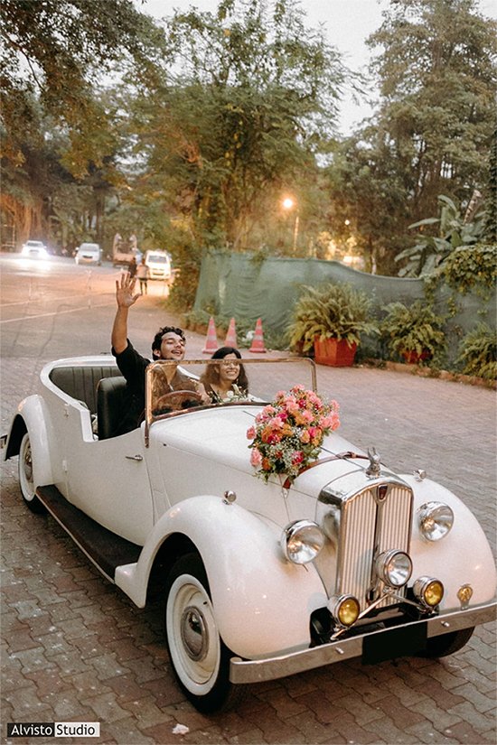 Vintage wedding car for classic romantic arrival